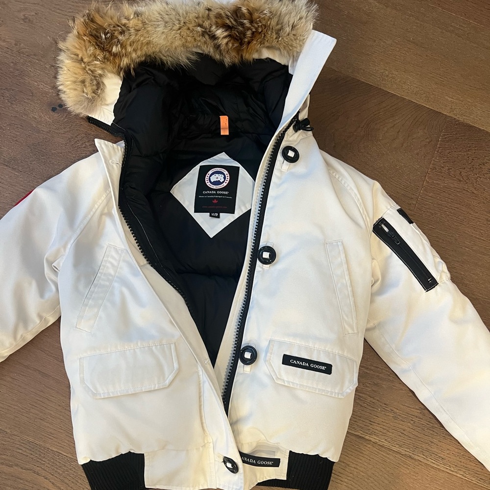 Canada Goose Cream Jacket with Black Accents.  Great condition